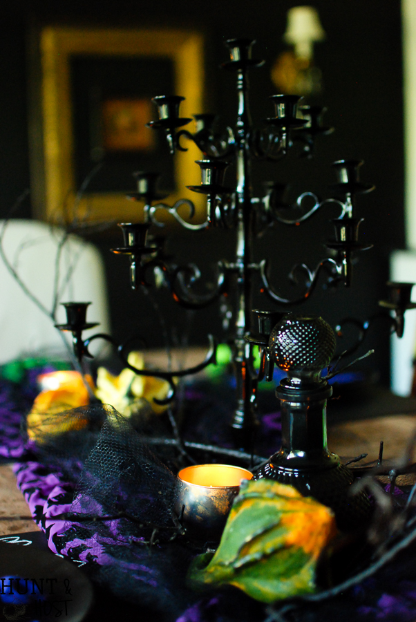 Dollar store crafts turn into a spooky fun Halloween table setting! Check out these easy and inexpensive Halloween ideas.