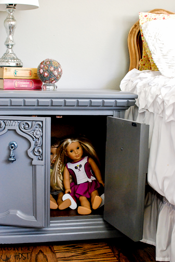 This painted furniture makeover is perfect for my almost teenage girls bedroom! A little glam on the hardware is the crowning touch on a not to young, not to old nightstand makeover. 