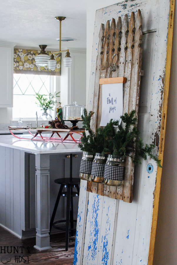 My Christmas farmhouse homes tour, featuring a sled centerpiece, vintage hat boxes, fresh cut greenery and pops of red and green. 