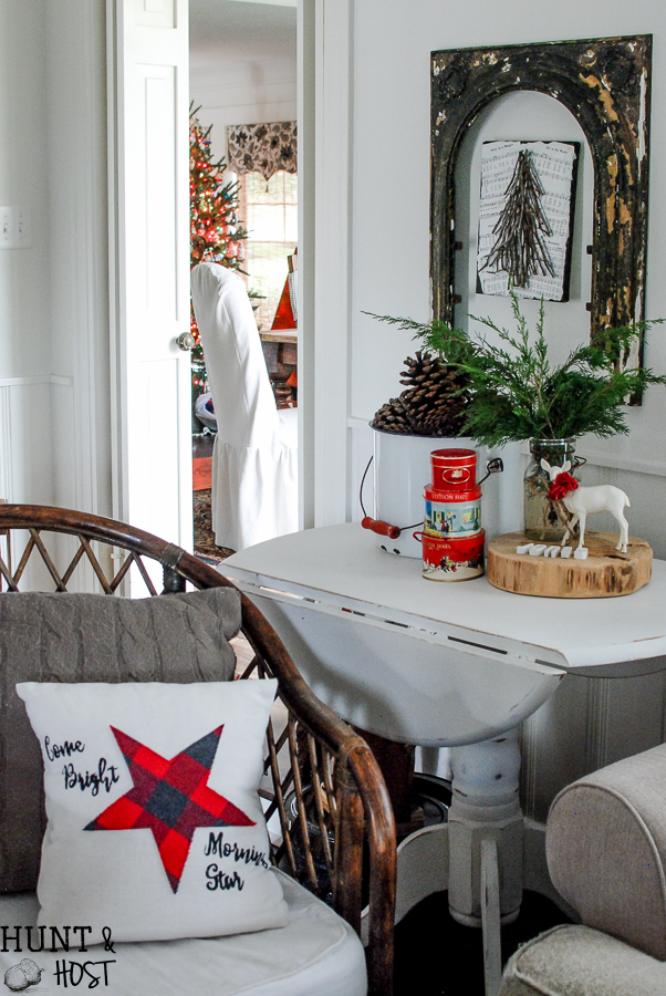 My Christmas farmhouse homes tour, featuring a sled centerpiece, vintage hat boxes, fresh cut greenery and pops of red and green. 