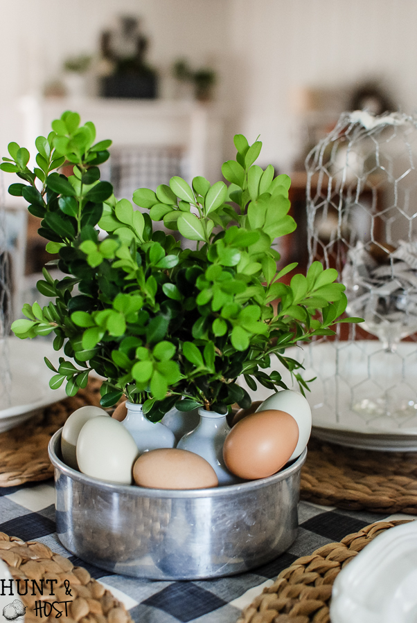 Easy Easter decorating ideas from a DIY chicken wire cloche tutorial to newspaper nests. All you need for the most beautiful spring tablescape.