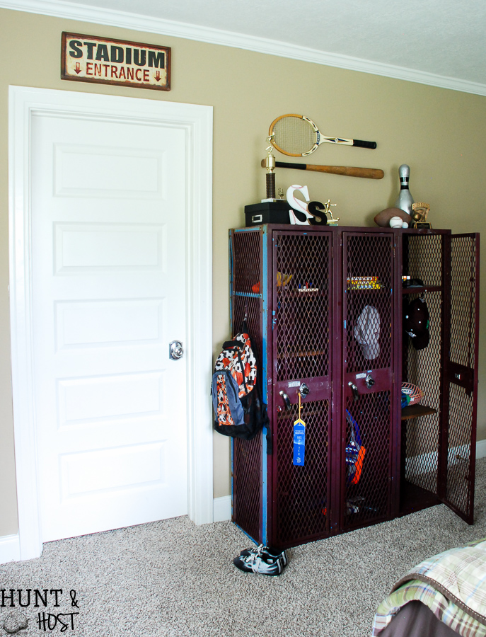 Old school lockers or gym lockers make great storage but you can add more. Here is an easy way to add extra storage to these vintage lockers. Perfect for a boy's room, laundry room or kid's storage. 