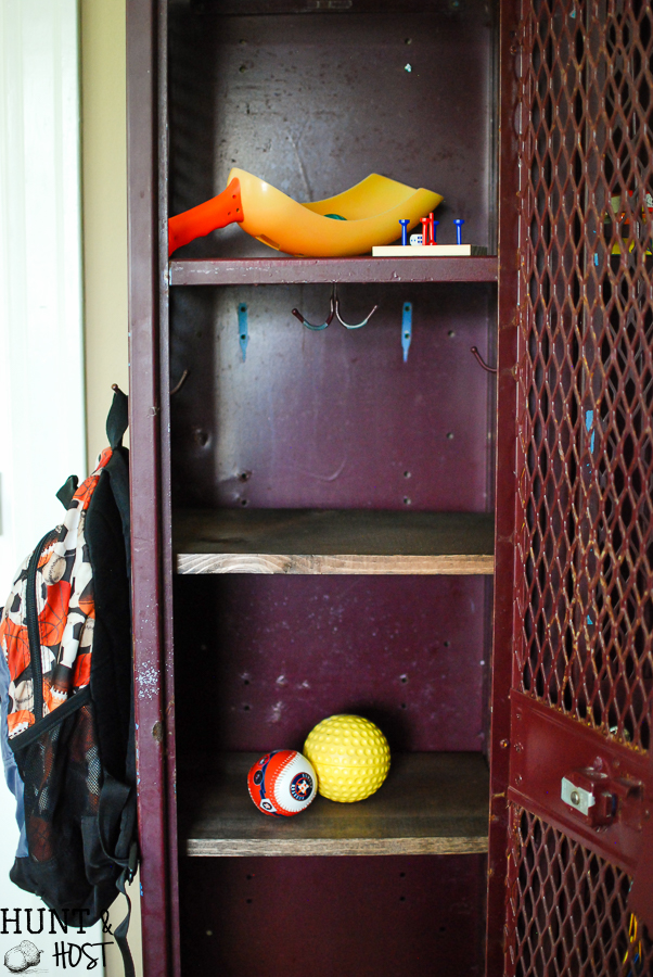 Old school lockers or gym lockers make great storage but you can add more. Here is an easy way to add extra storage to these vintage lockers. Perfect for a boy's room, laundry room or kid's storage. 