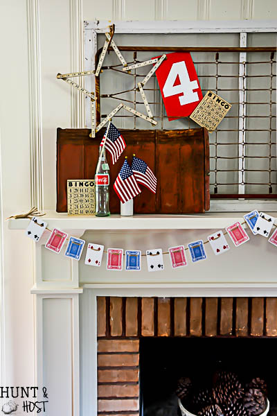 How cute is this playing card garland...great 4th of July decorating ideas here, red, white and blue from the dollar store!