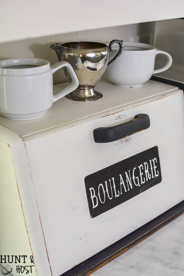 This bread box makeover is perfect for hiding kitchen clutter, kitchen storage ideas, a great coffee bar or the perfect family charging station. 80's bread box to French Country Décor!
