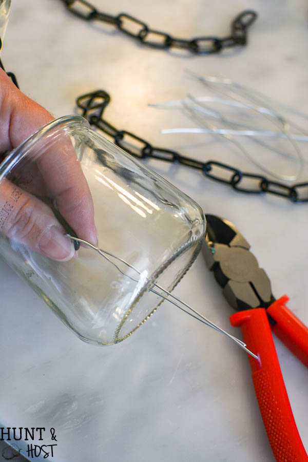 DIY rain chain tutorial, easy and inexpensive oui yogurt jar crafts. This rain chain makes a rainy day beautiful!