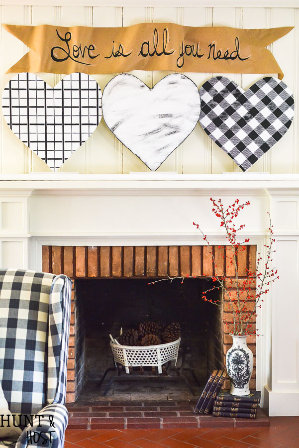 This giant DIY for Valentine's Day can be made in any size and would be great for other holidays! DIY Valentine's Day decor hearts are easy to style to your decor, black and white buffalo check and plaid shirt patterns add a fun touch instead of traditional Valentine pink! 
