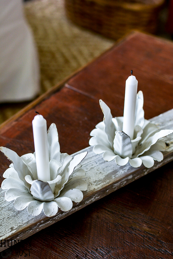 Marry your old wedding candelabra to a picket fence board for the cutest DIY hime decor with vintage style. This quick and easy DIY candle holder get you thinking about what other thrifted finds you can take apart and put back together again in a more useful way! #candleholder #picketfenceproject #thriftedfind #cottagestyle #farmhousedecor #farmhousecandle #cottagedecor #makeitnew