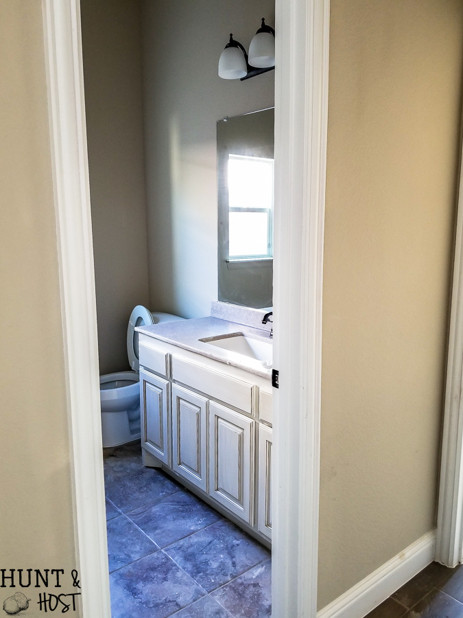 Before pictures of a very vanilla builder grade home ready to get a personal and cozy makeover on a budget full of DIY ideas, tips and tricks. Follow along this cookie cutter home makeover!