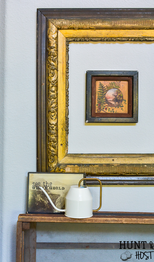 Do you wonder what to do with old photographs? See vintage photos all the time in thrift stores and flea markets? This easy DIY idea will help you add vintage artwork to your home in no time for little cost. These old photo updates are perfect for styling vignettes, gallery walss or updating family photos with personal meaning. #oldphotograph #vintage style #vignette #gallerywall #stencilproject #chalkart #makerboss