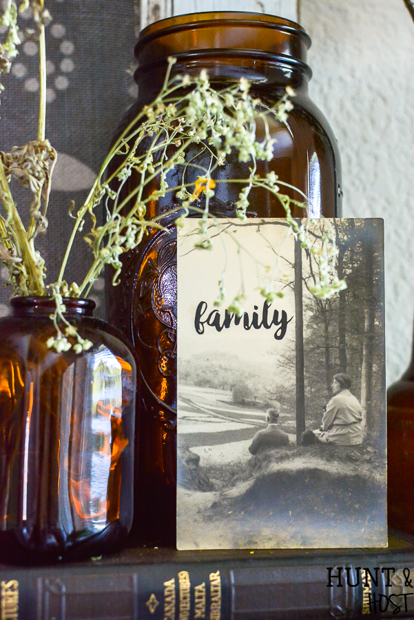 Do you wonder what to do with old photographs? See vintage photos all the time in thrift stores and flea markets? This easy DIY idea will help you add vintage artwork to your home in no time for little cost. These old photo updates are perfect for styling vignettes, gallery walss or updating family photos with personal meaning. #oldphotograph #vintage style #vignette #gallerywall #stencilproject #chalkart #makerboss