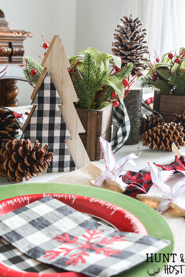 This Christmas go mad for plaid with these precious DIY Christmas placemats, use buffalo check and fabulous CHristmas ribbon to decorate your Christmas table in style with this easy DIY. #ad #handmadewithjoann @JOANN #buffalocheck #plaidholiday #Christmastable #DIYChristmasdecor #easyChristmascraft #christmasribbon